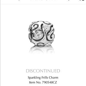 Pandora Sparkling Frills Charm. Clear cz.